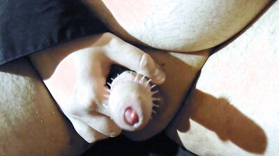 Small-dicked guy is playing with his genitals on the camera