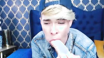 Blonde twink Henry Price Win plays with a dildo on webcam