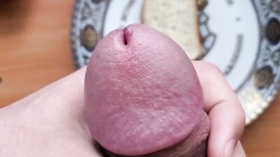 Horny man is jerking off and jizzing on that piece of bread