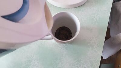 Kinky chum is jerking off and jizzing in a coffee cup