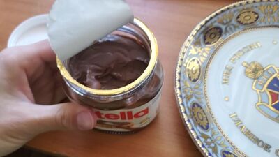 Perverted guy masturbates in the kitchen and jizzes on a plate