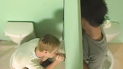 Twink sucks a dick and gets fucked thorough a gloryhole