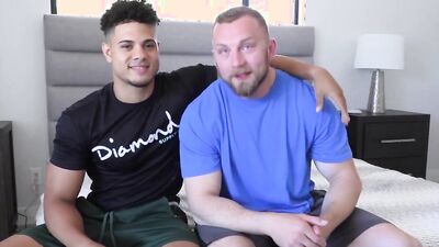 Latino twink and beefed guy are having oral sex in 69 position
