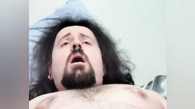 Straight bearded bloke is filming himself while stroking a cock