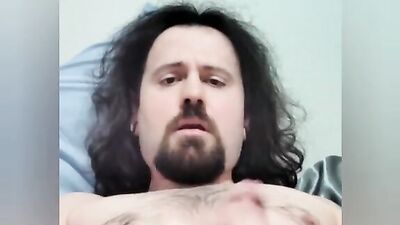 Straight bearded bloke is filming himself while stroking a cock