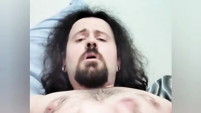 Straight bearded bloke is filming himself while stroking a cock