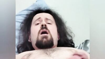 Straight bearded bloke is filming himself while stroking a cock