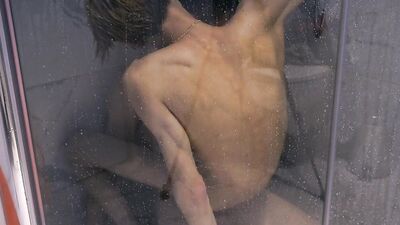Two skinny gay chaps are having sex in the shower