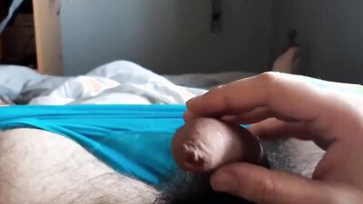 Amateur fella is stroking his pecker in front of the camera
