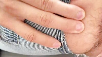 He tore his jeans and stretched the hole well with his thick