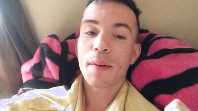 Cute amateur gay chap is posing in front of the camera
