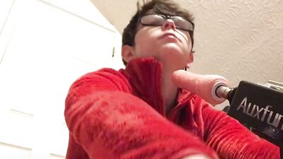 Cute twink with glasses drills his ass with a fucking machine