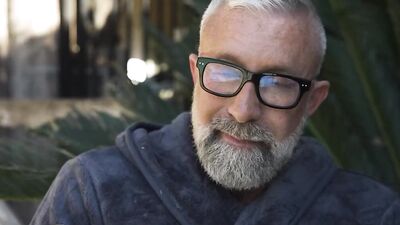 Bearded daddy slobbers on a big black cock before ramming his partner