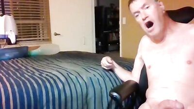 Naked guy teases with his big cock and jerks off solo