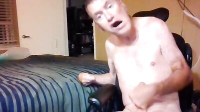 Naked guy teases with his big cock and jerks off solo