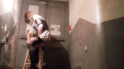 Naughty crossdresser in fishnet outfit fucks a pumpkin and jerks off