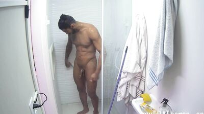 Handsome dude with tattoos and muscles takes a steamy shower
