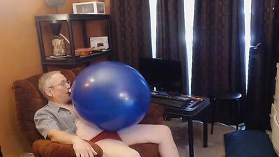 Older guy blows big balloons up and fucks them hard