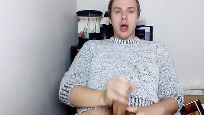 Cute gay guy pulls his dick out and strokes it hard