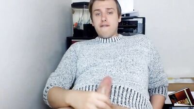 Cute gay guy pulls his dick out and strokes it hard