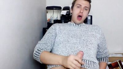 Cute gay guy pulls his dick out and strokes it hard