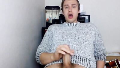 Cute gay guy pulls his dick out and strokes it hard