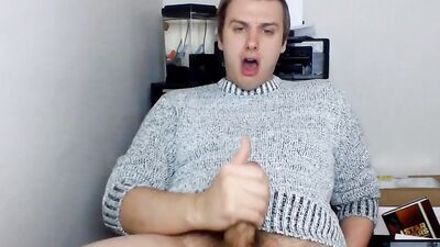 Cute gay guy pulls his dick out and strokes it hard