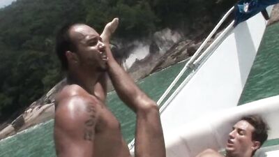 Tanned guy takes a cock in the ass on a boat