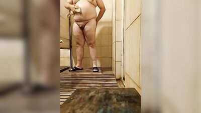 Chubby guy jerks off while taking a shower and in locker rooms