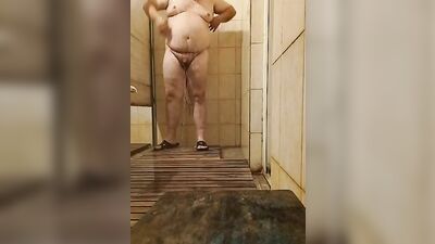 Chubby guy jerks off while taking a shower and in locker rooms