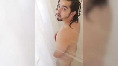 Twink with long hair and nice abs takes a steamy shower