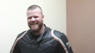 Buff biker takes his clothes off and masturbates with a toy