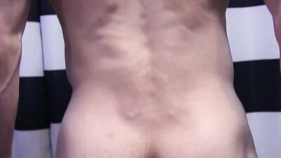 Muscly dude with hard abs tugs on his fat cock