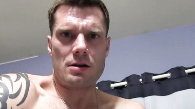 Muscly dude with hard abs tugs on his fat cock