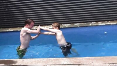 Skinny guy has fun in the pool before jerking off in the sun