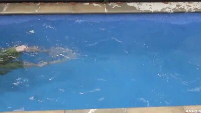 Skinny guy has fun in the pool before jerking off in the sun
