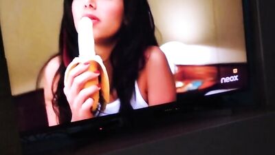 Hung guy watches a movie and tugs on his massive cock