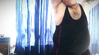 Chubby dude teases and takes his clothes off before masturbating solo