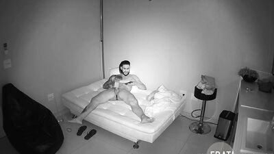 Handsome guy caught on a hidden camera jerking off at night