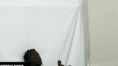 Black army guy strips his clothes and strokes that big cock