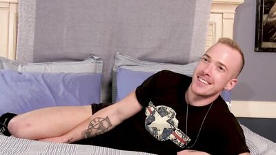 Dashing jock fingers his ass and strokes his throbbing cock