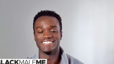 Athletic black stud oils his body up and jerks off