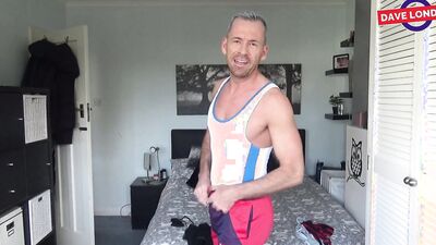 Fit and experienced stud shows off different outfits before masturbating