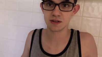 Nerdy twink with glasses fucked by a stud in the shower