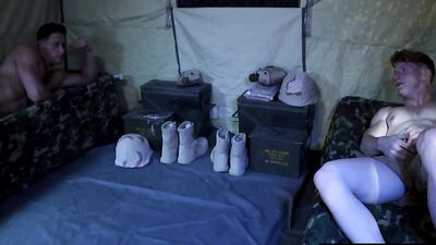 Army jock deepthroats cock in a tent and takes a banging
