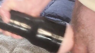 Hot stud with a throbbing cock jerks off and uses a fleshlight