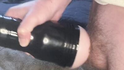 Hot stud with a throbbing cock jerks off and uses a fleshlight