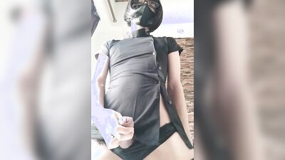 Naughty Japanese crossdresser in a facemask strokes his big cock