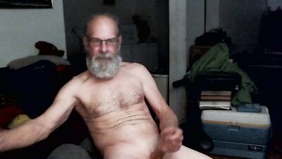 Bald mature dude with a hard dick jerks off in front of the camera