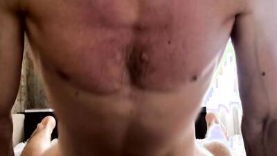 Muscular hunk shows his rock hard abs off and masturbates